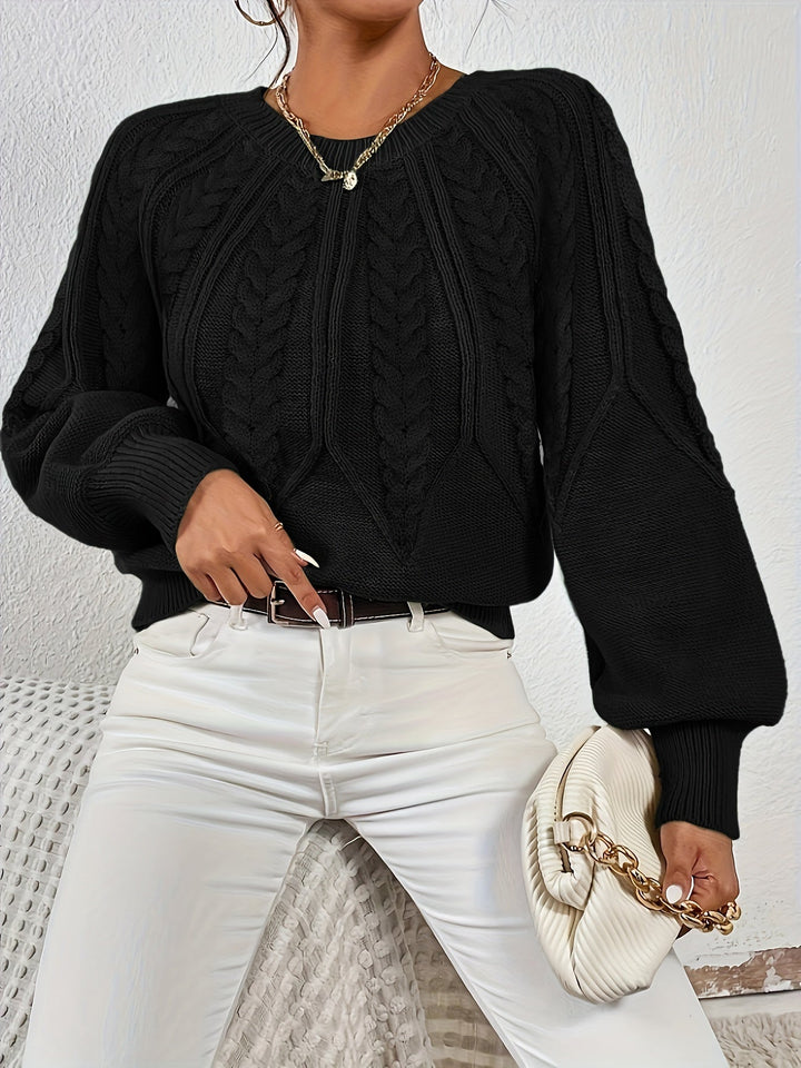 Women's relaxed fit cable knit top, featuring a classic pattern and fashionable lantern sleeves.