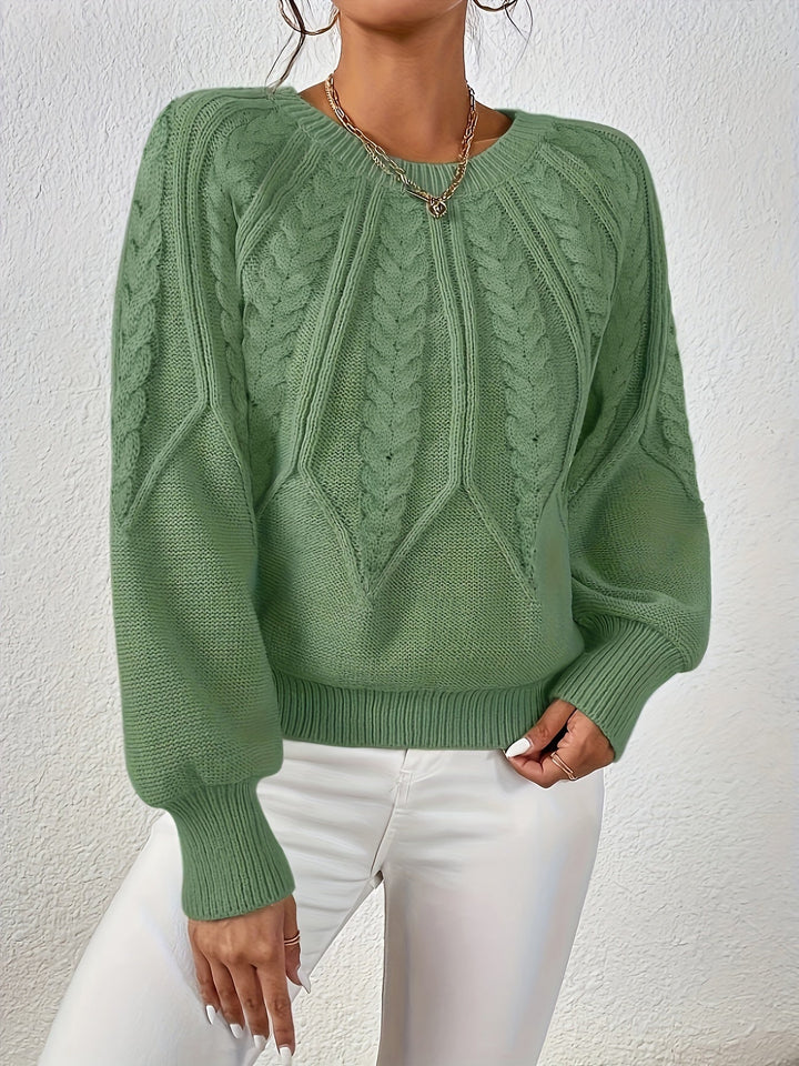 Chic women's pullover: cable knit, relaxed fit, and beautiful lantern sleeves for winter style.