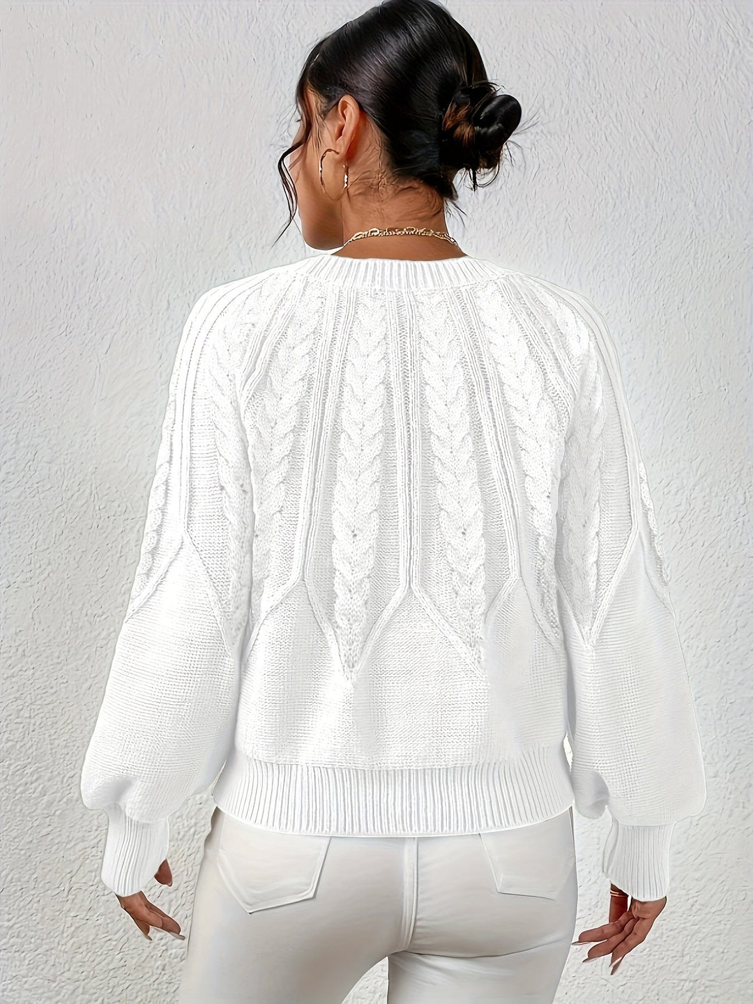 Women's comfortable cable knit sweater, relaxed fit, unique lantern sleeves, versatile for any occasion.