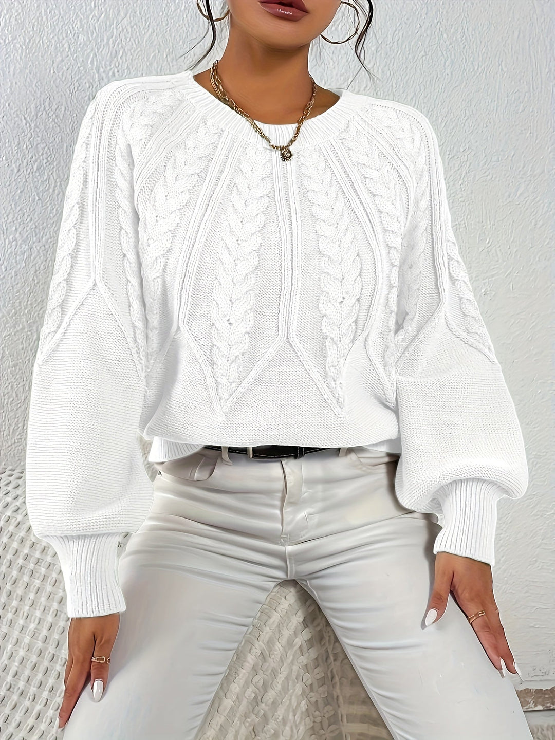 Women's winter warmth cable knit sweater, relaxed fit, chic lantern sleeves, comfort and style.