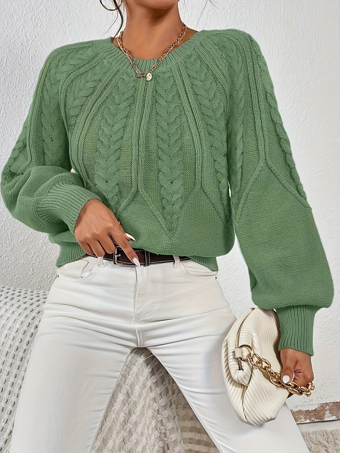 Comfortable women's everyday sweater, cable knit pattern, relaxed fit, and unique lantern sleeves.