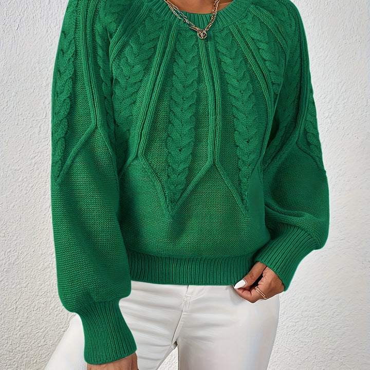 Chic women's relaxed fit cable knit sweater, featuring beautiful lantern sleeves and a comfortable feel.