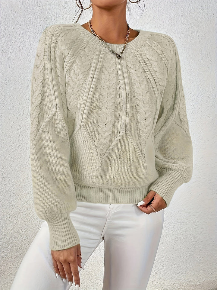 Casual women's cable knit sweater, relaxed fit, lantern sleeves, great for cozy knitwear.