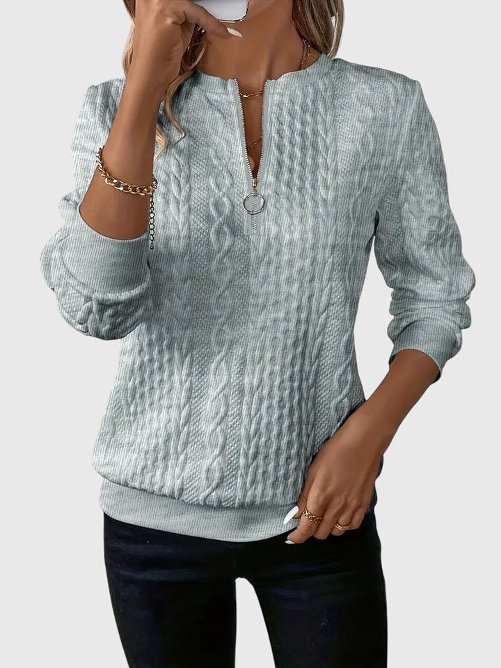 Comfy women's cable knit quarter-zip for relaxed fall outfits.