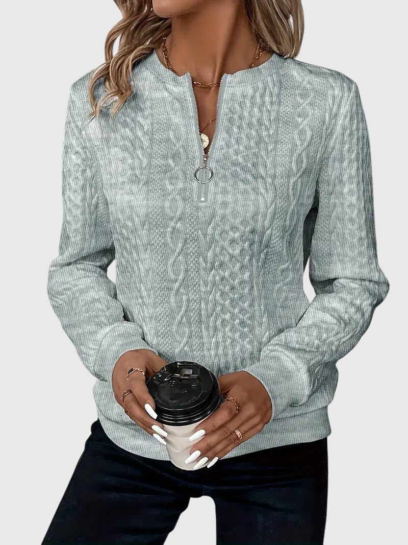 Elegant women's cable pattern quarter-zip, a must-have fall pullover.