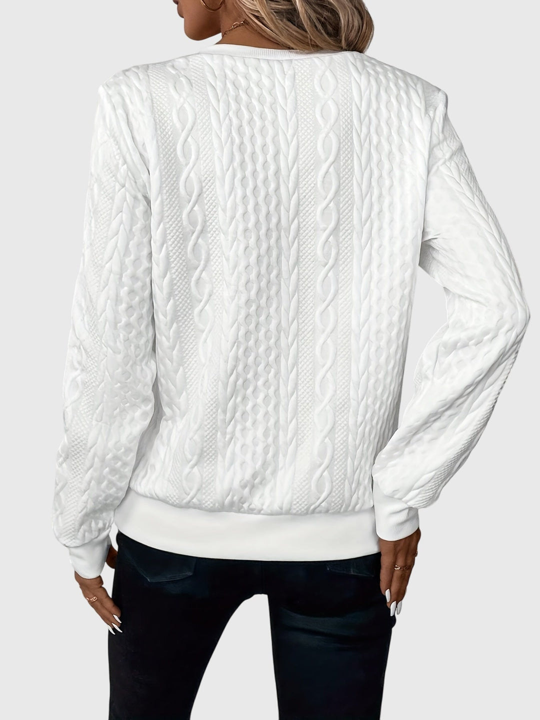 Textured women's cable knit quarter-zip pullover, long sleeve comfort.