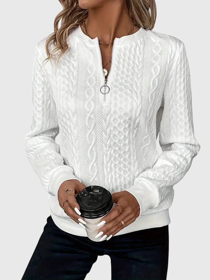 Classic women's cable pattern quarter-zip sweater, versatile pullover.