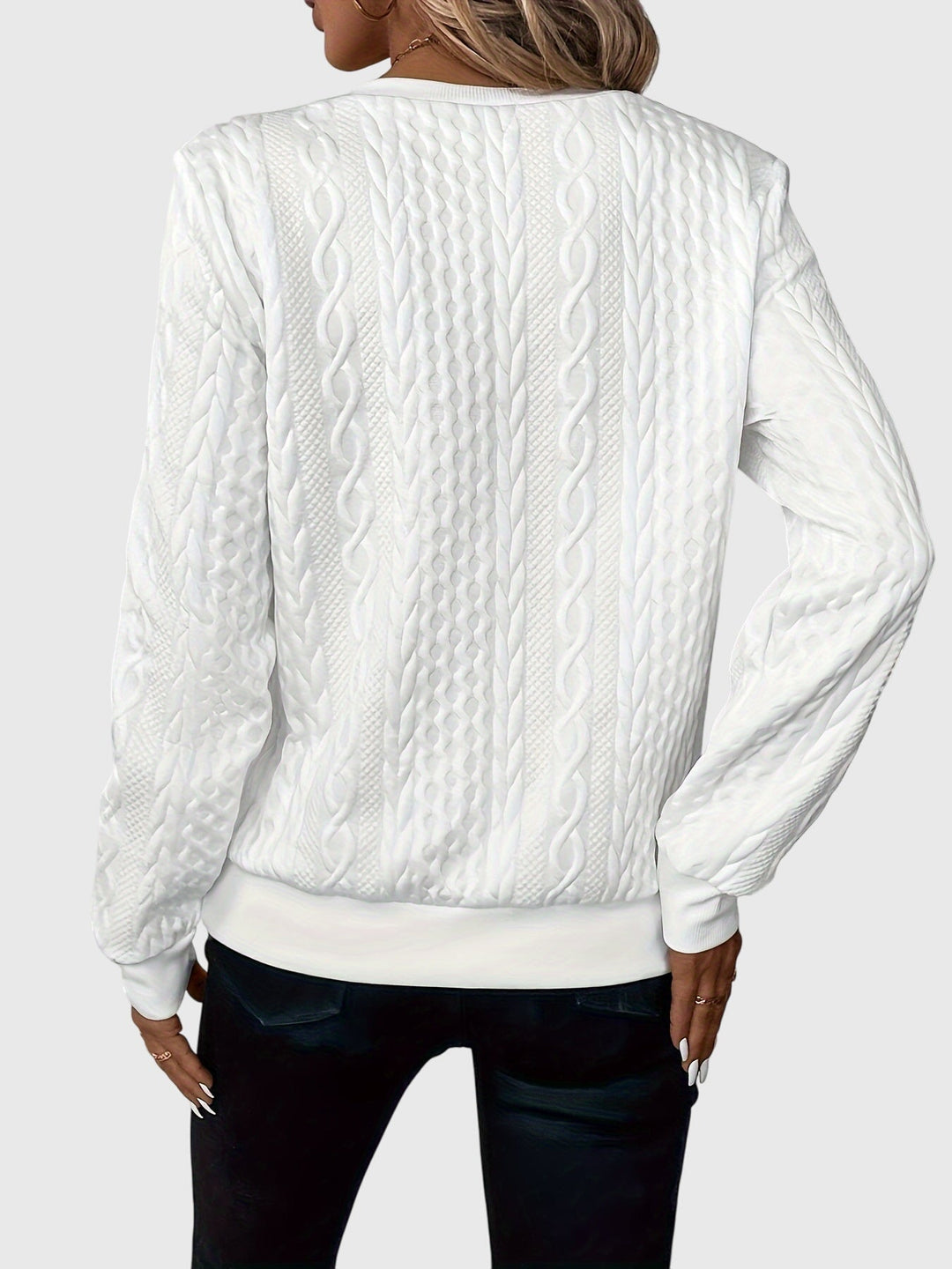 Fall fashion: Women's cozy cable knit quarter-zip sweater, casual style.