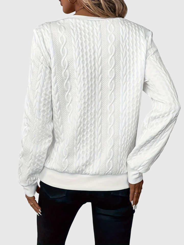 Fall fashion: Women's cozy cable knit quarter-zip sweater, casual style.