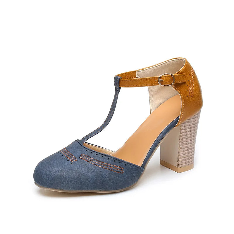 Women's two-tone block heels with elegant ankle strap. Comfortable & stylish dress shoes for versatility.