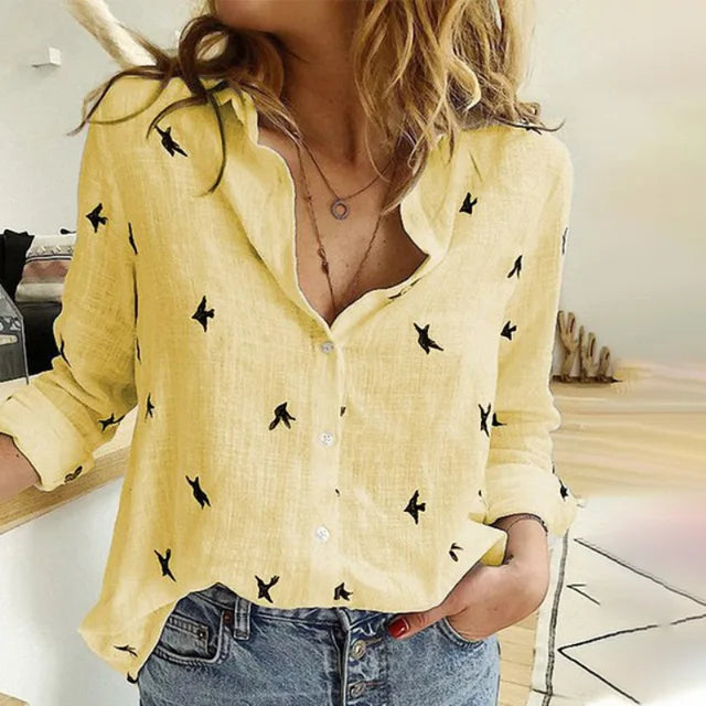 Stylish women's casual blouse with unique bird print & button-up front. Comfortable long-sleeve top for everyday fashion.
