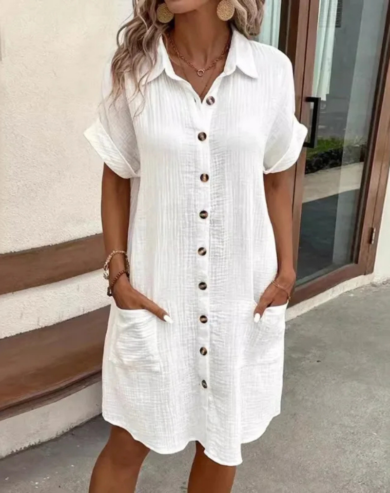 Women's casual button-down collared mini shirt dress, perfect for everyday wear. Relaxed fit day dress.