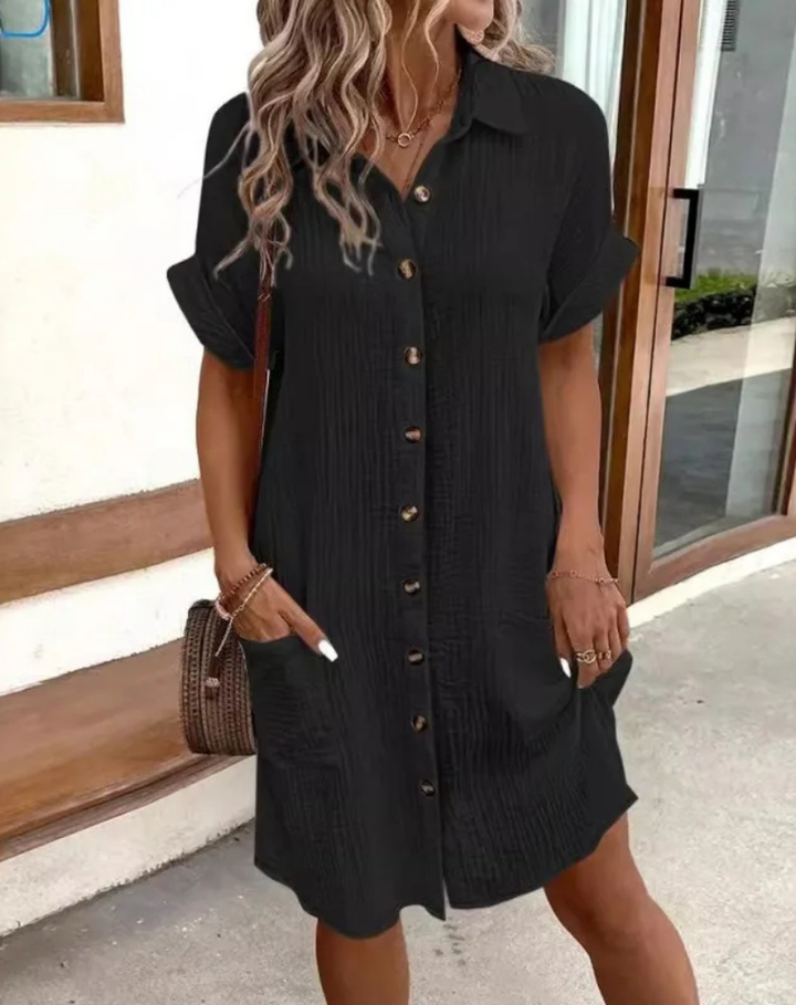 Versatile women's casual collared shirt dress. Relaxed fit button-down mini dress for stylish everyday comfort.