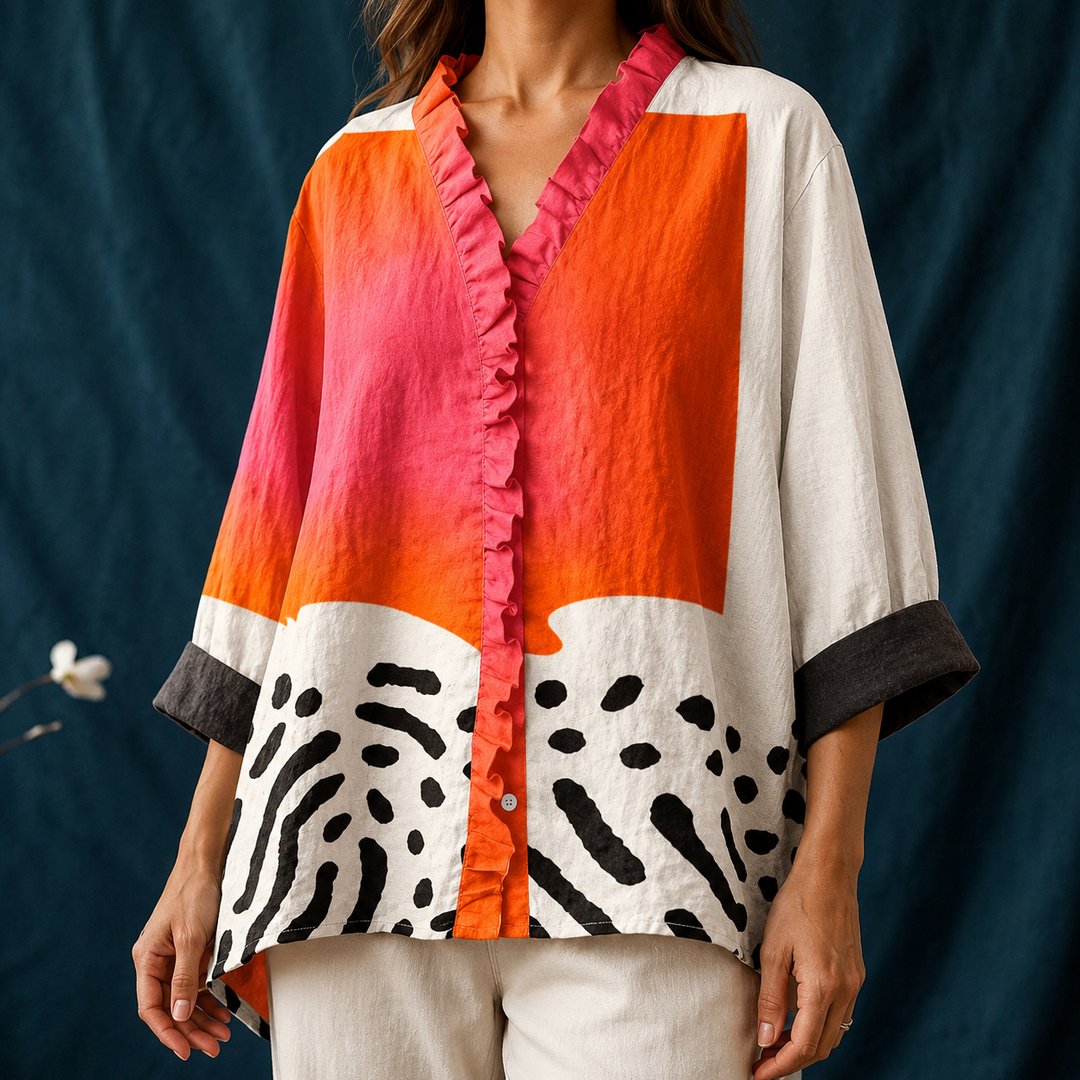 Stylish women's casual blouse featuring abstract block pattern. Relaxed fit, long sleeve V-neck button-up shirt for comfort.