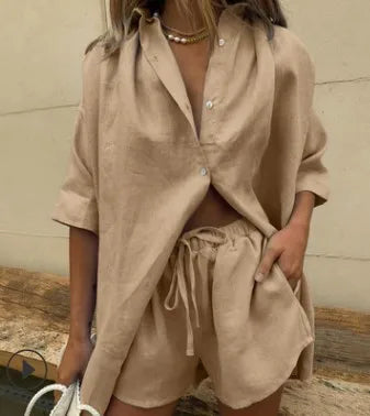 Stylish women's two-piece casual shorts set with button-up shirt & elastic waist shorts. Perfect comfy summer vacation wear.