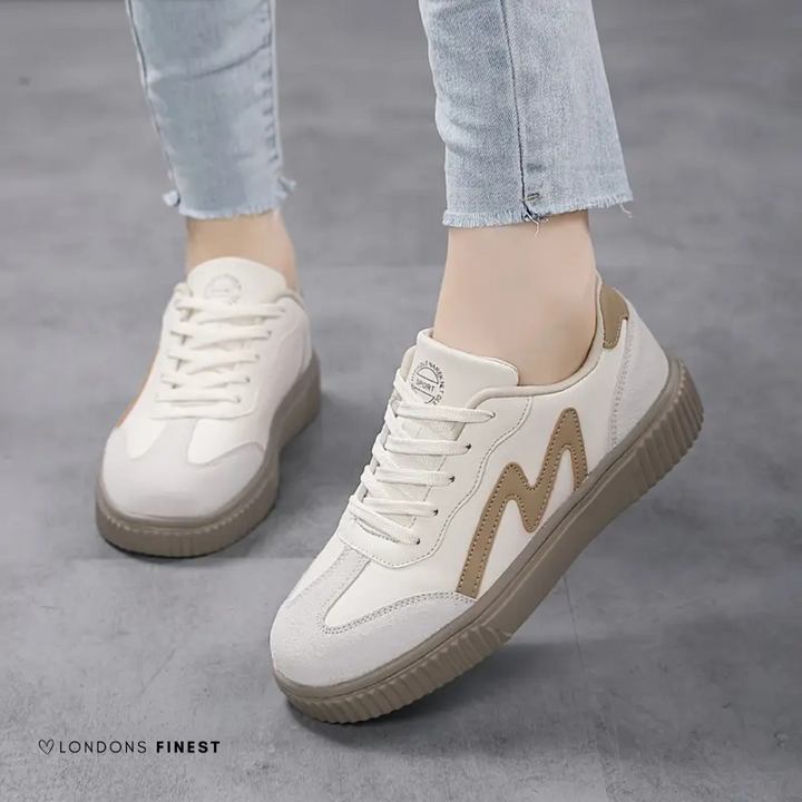 Women's casual comfort sneakers, supportive & cushioned for daily walking. Stylish everyday footwear.
