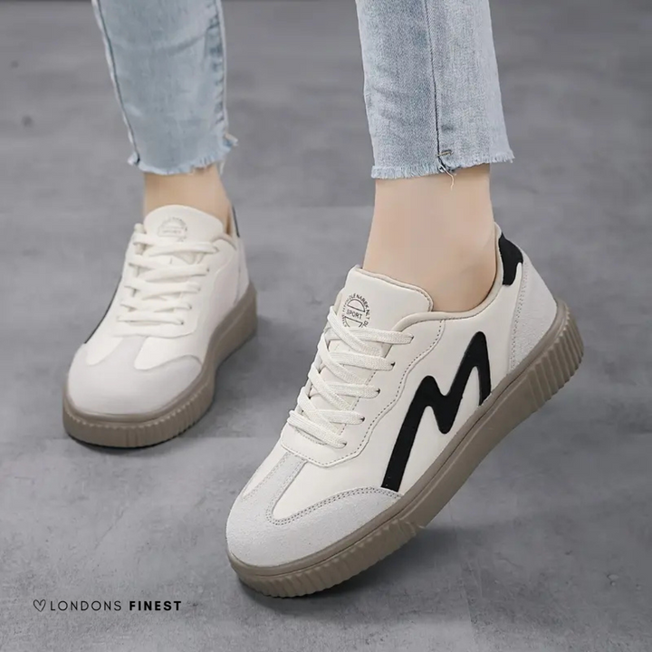Stylish women's comfort sneakers for casual daily wear. Supportive walking shoes with cushioned design.