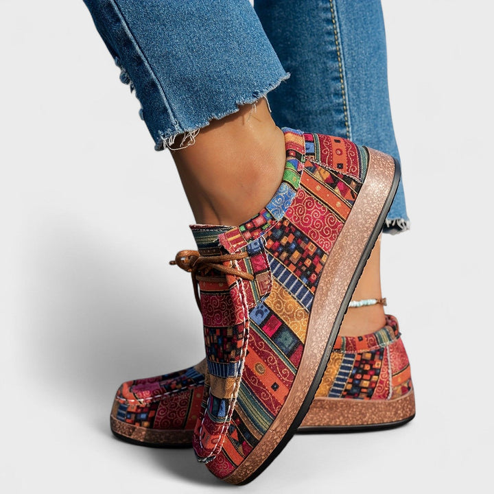 Stylish women's slip-on sneakers for daily wear. Features a wide heel & breathable design for comfort.
