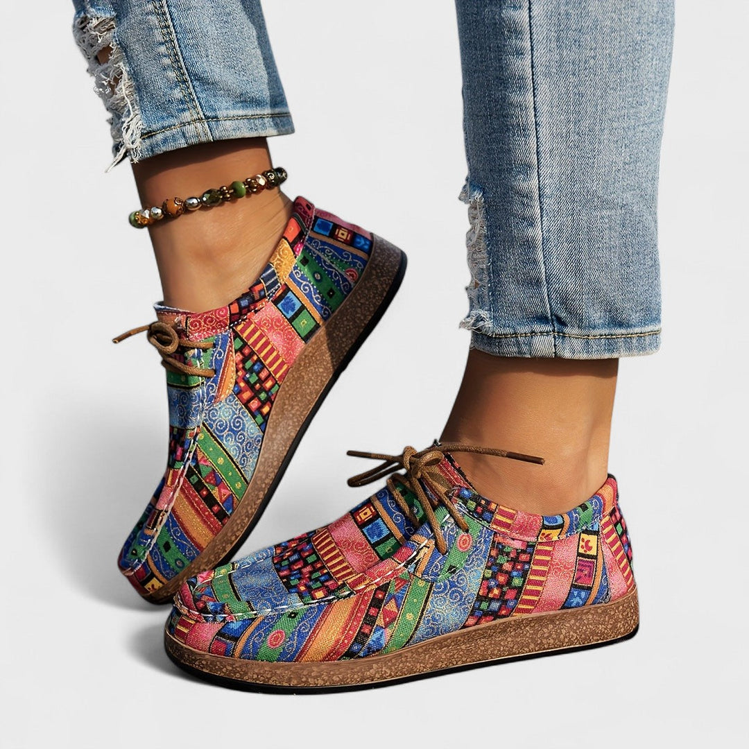 Comfortable women's walking shoes with a wide, stable heel & adjustable fit. Perfect for active daily use.