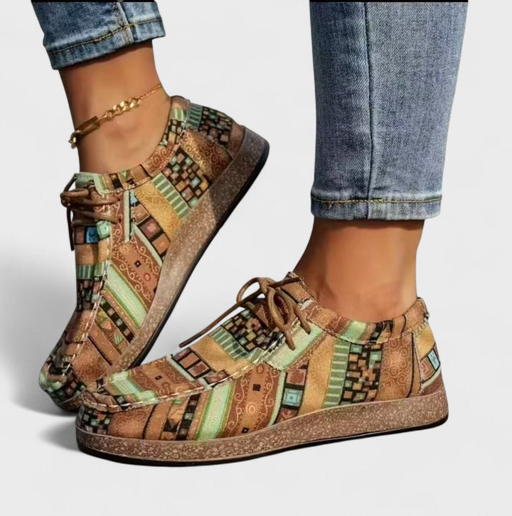 Athletic fashion women's sneakers featuring a wide, stable heel for enhanced balance and all-day comfort.