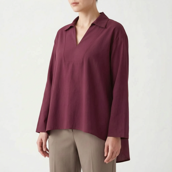 Casual women's high-low tunic blouse. Long sleeve, loose fit top for effortless everyday style and comfort.