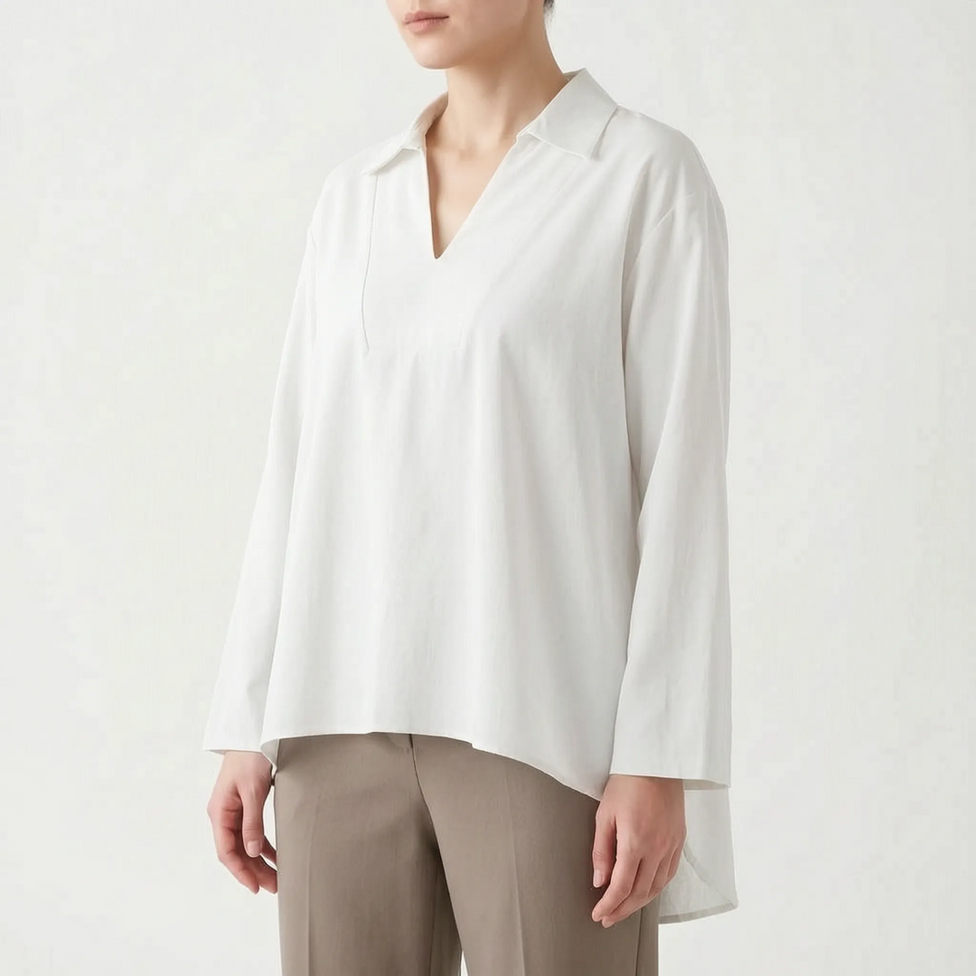 Collared V-neck high-low tunic for women. Loose fit long sleeve blouse, perfect for casual or smart casual looks.