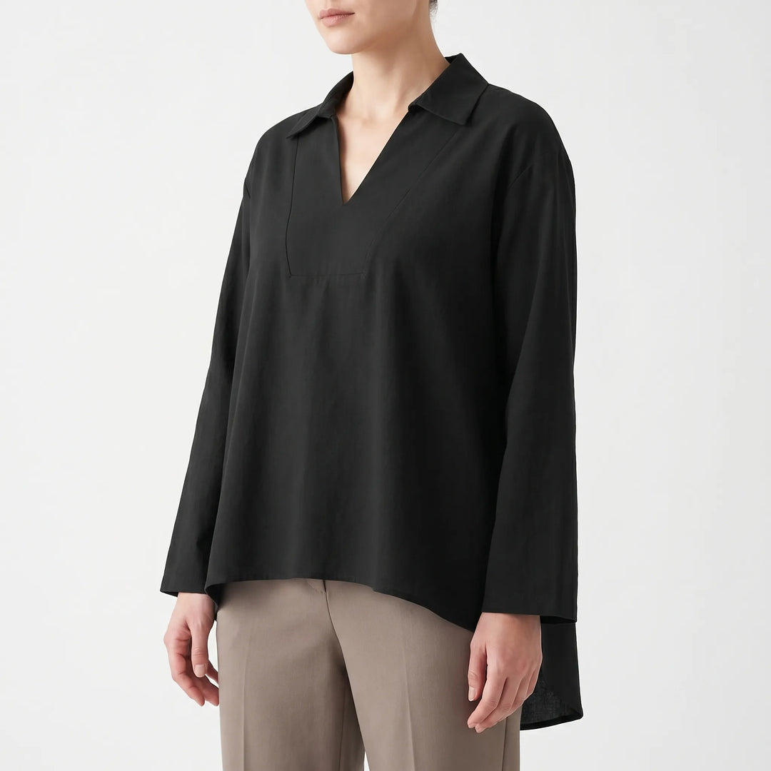 Versatile women's solid color high-low tunic. Everyday long sleeve blouse with a loose fit for effortless style.