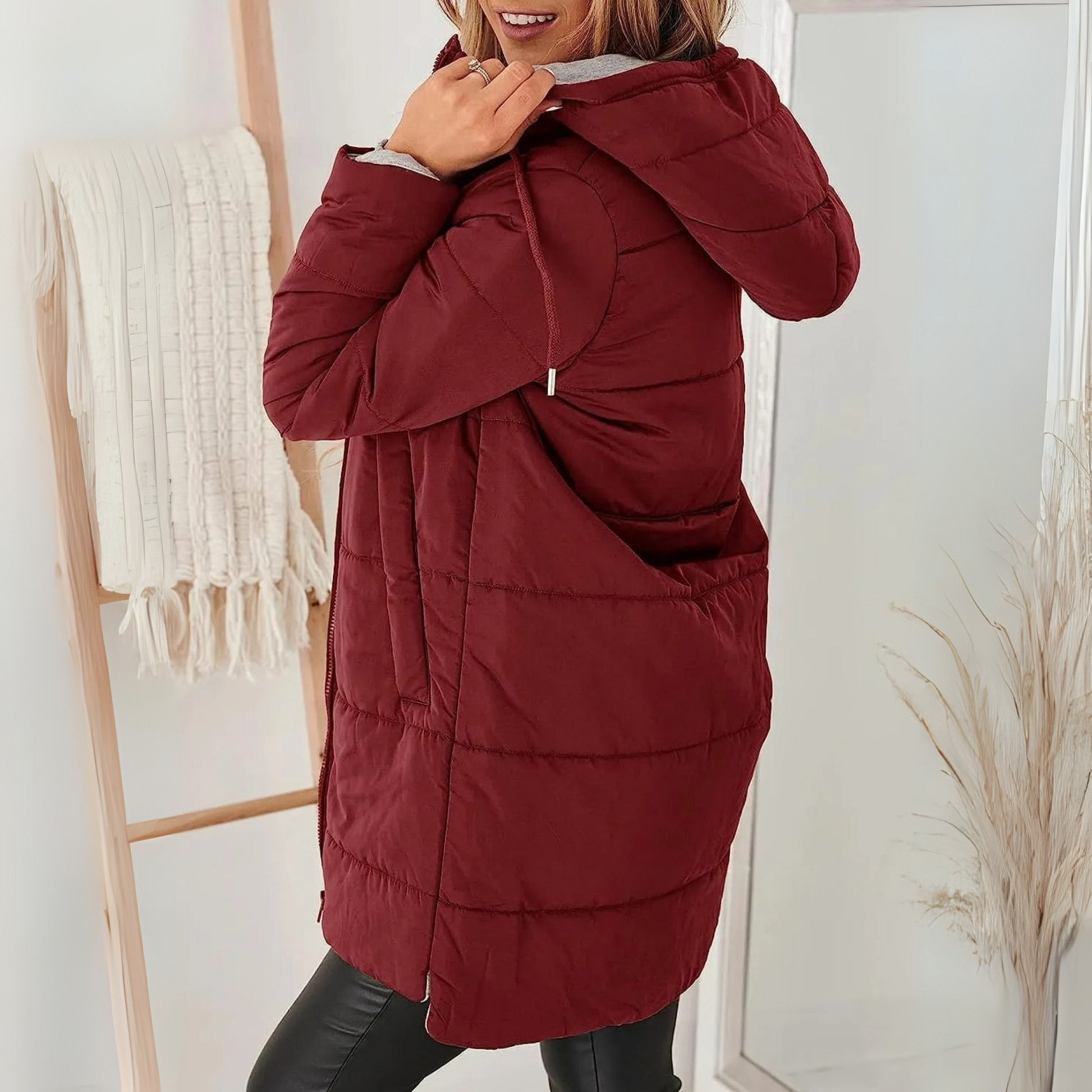 Stylish women's hooded puffer jacket with cozy warmth for winter, ideal casual outerwear.