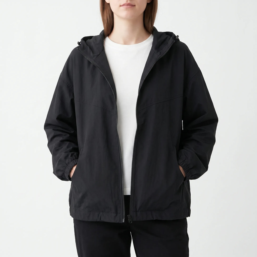 Stylish women's windbreaker jacket with hood. Ideal for activewear, casual outings & light weather protection. Everyday versatile.