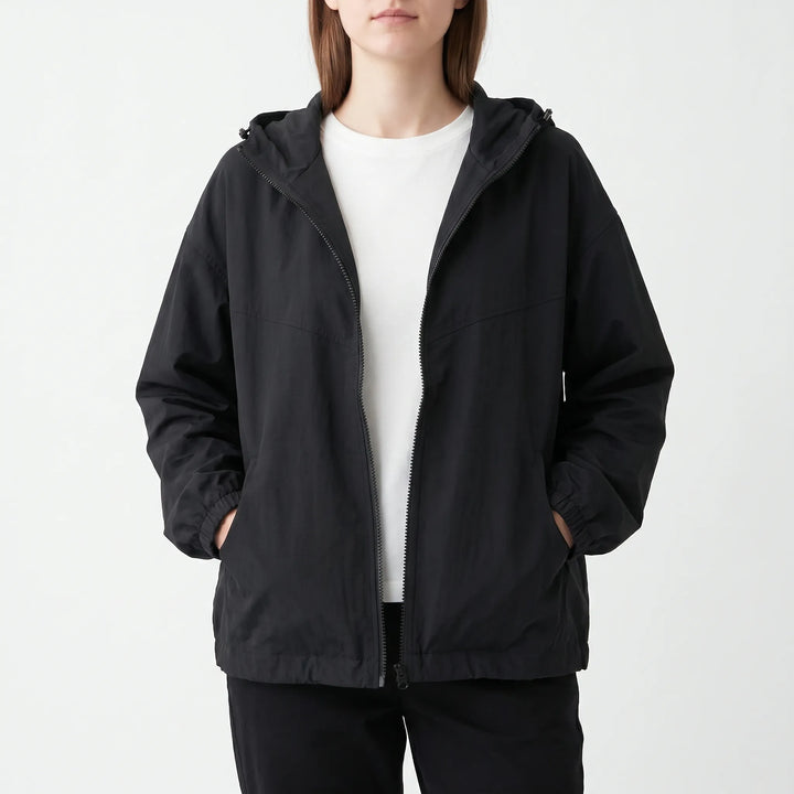 Stylish women's windbreaker jacket with hood. Ideal for activewear, casual outings & light weather protection. Everyday versatile.