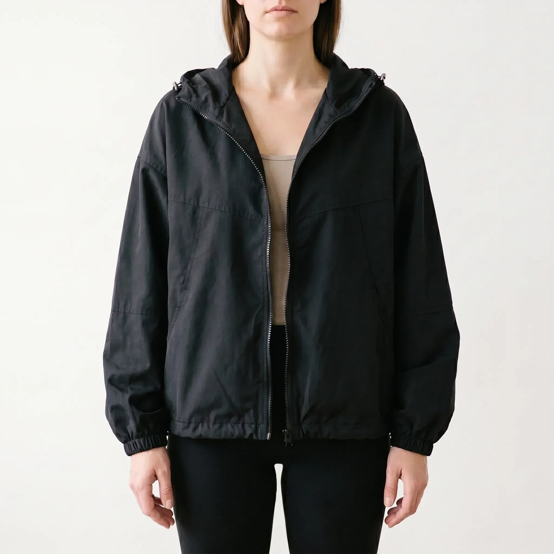 Fashionable women's casual hooded jacket. Comfortable and lightweight outerwear, great for spring, fall, or transitional style.