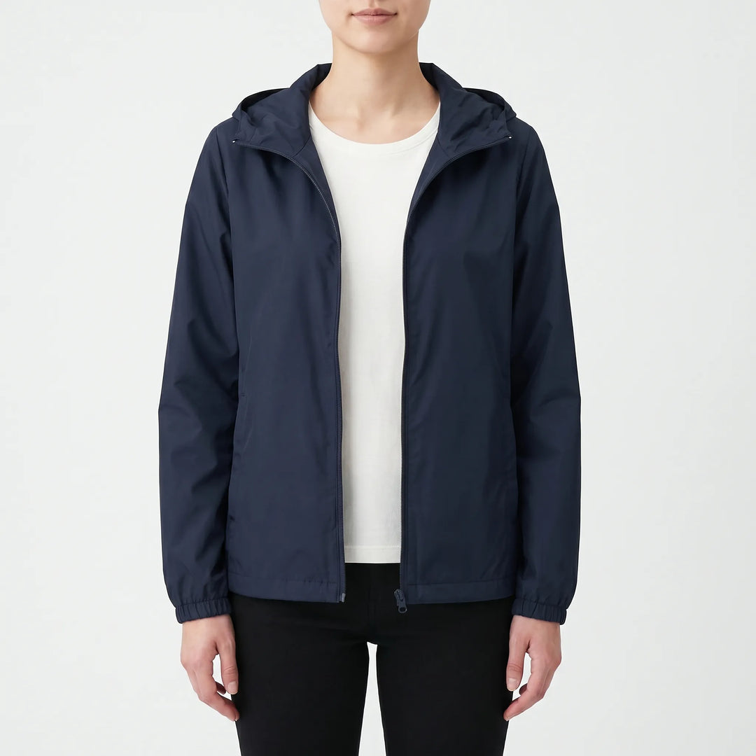 Lightweight women's hooded windbreaker, a casual zipper jacket for outdoor spring and fall activewear.
