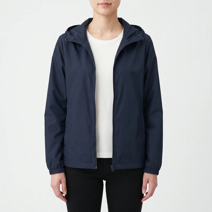 Lightweight women's hooded windbreaker, a casual zipper jacket for outdoor spring and fall activewear.