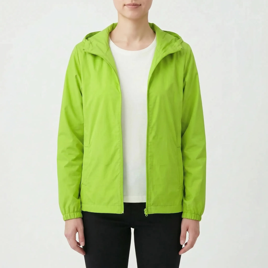 Comfortable women's hooded windbreaker jacket, offering lightweight protection for outdoor spring activities.