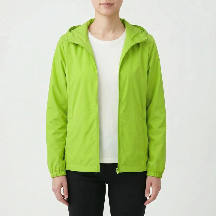 Comfortable women's hooded windbreaker jacket, offering lightweight protection for outdoor spring activities.