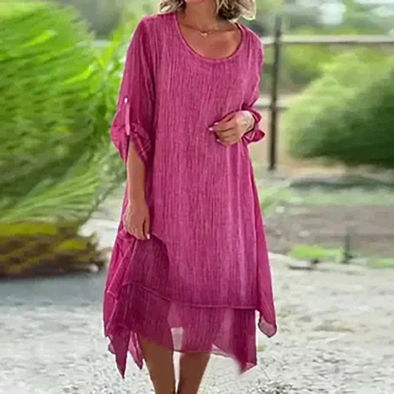 Stylish blue layered midi dress for women. Casual 3/4 sleeve summer dress, comfortable and flowy design.