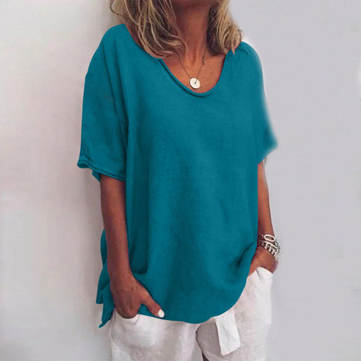Soft pink women's casual loose-fit t-shirt, a comfy everyday wear top with a relaxed silhouette.