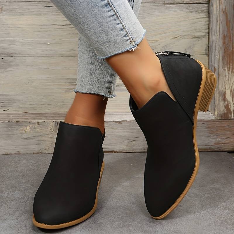 Green women's casual slip-on ankle boots. Stylish low block heel boots for comfortable everyday fashion.