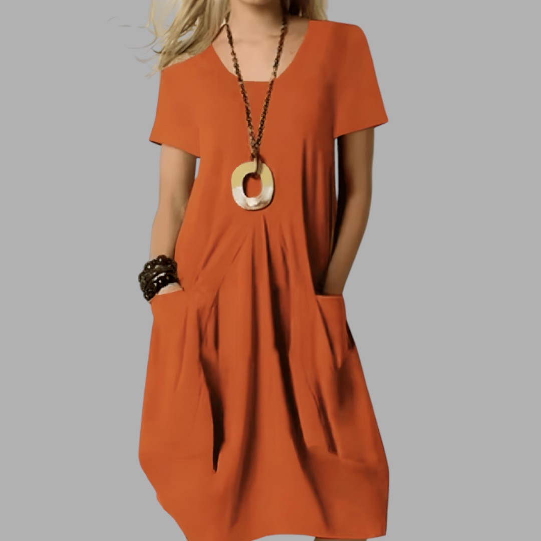 Flattering women's casual midi dress. Designed for everyday comfort and chic summer style. A versatile day dress.