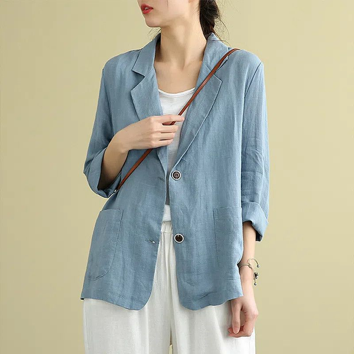 Women's casual relaxed fit single-breasted blazer with notch lapel. Perfect for effortless smart casual spring style.