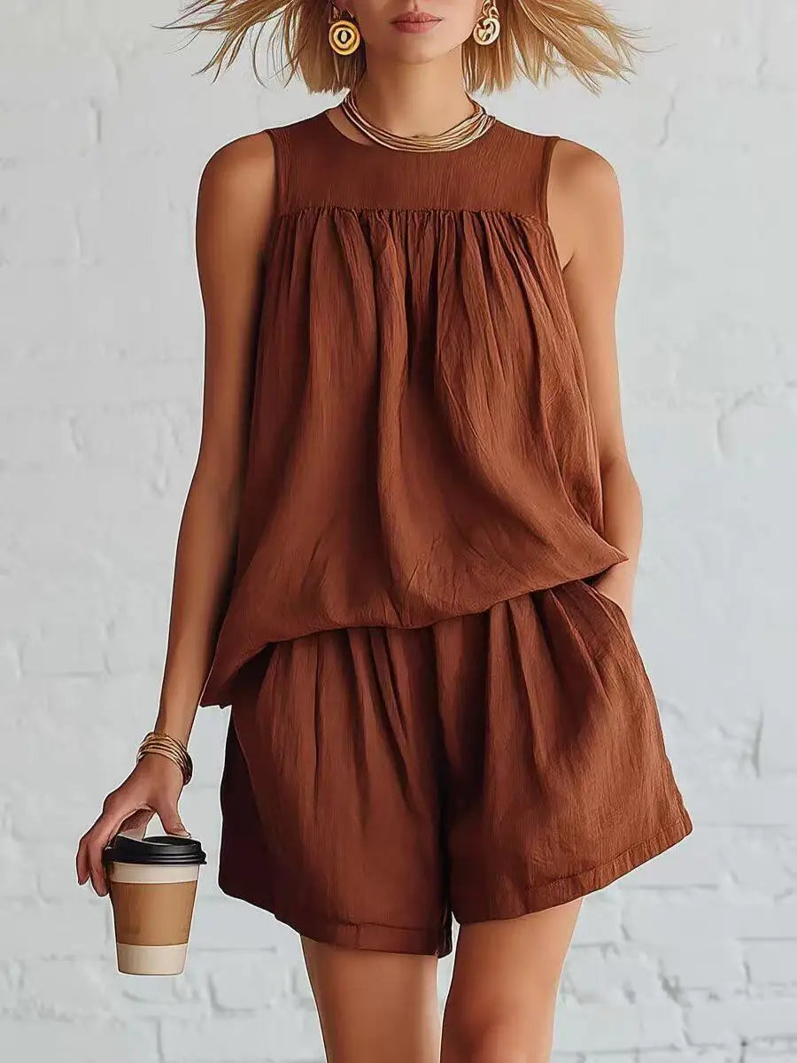 Effortless women's relaxed shorts set with sleeveless top & high-waisted shorts, a stylish casual summer two-piece outfit.