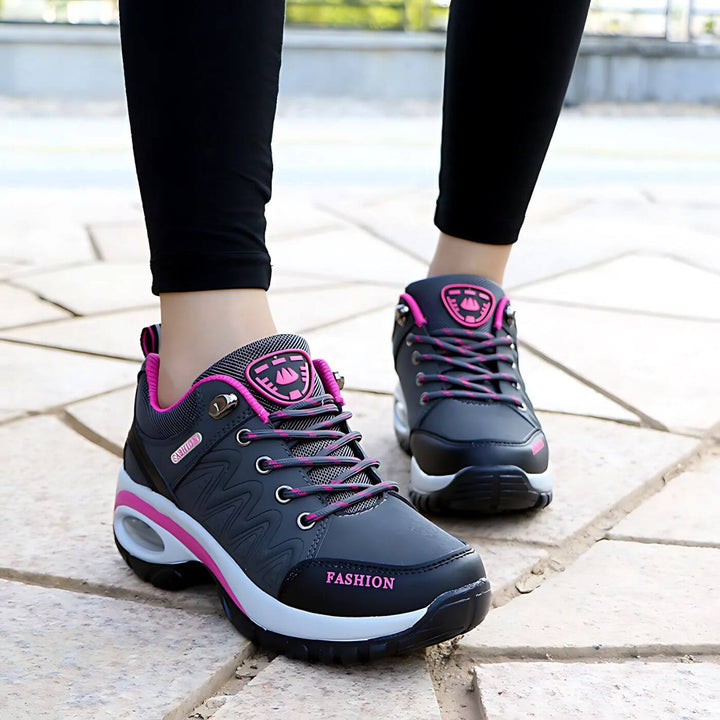 Ergonomic women's sneakers, designed for comfort and arch support, ideal for walking and daily wear.
