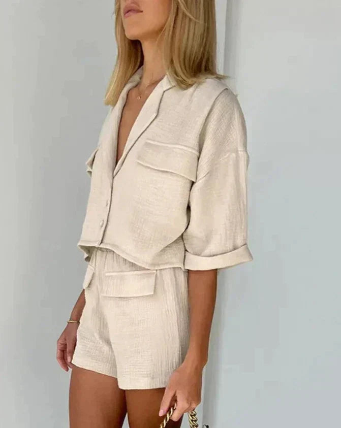 Comfortable women's two-piece short set for casual wear. Features a button-down top, great for summer fashion.