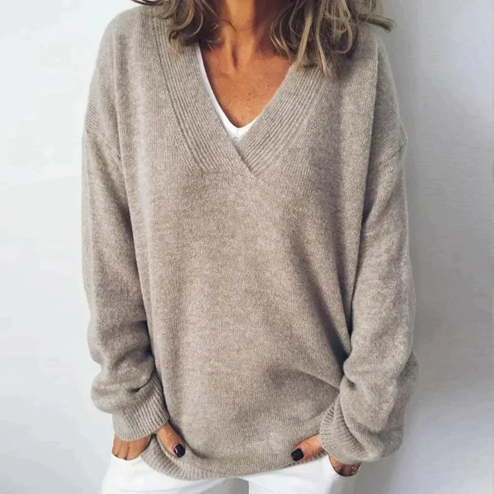 Women's casual V-neck long sleeve knit sweater in a relaxed fit, perfect for cozy autumn & winter comfort.