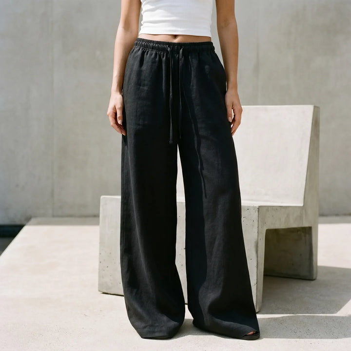 Women's casual wide-leg pants, high-waisted with a relaxed fit for comfortable everyday summer wear.