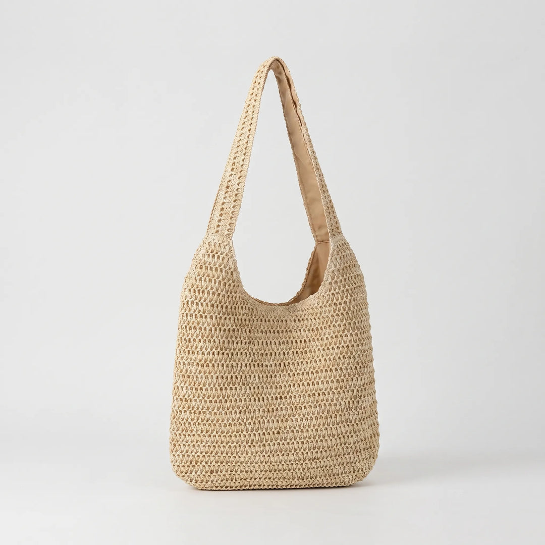 Stylish women's knit shoulder tote bag for summer, a chic accessory for travel or vacation.