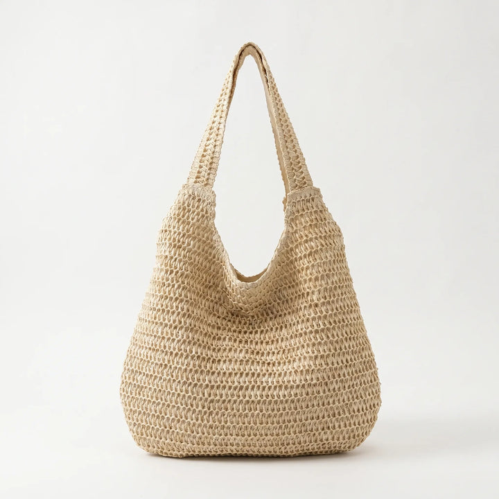 Lightweight woven shoulder bag for women, an open-top casual tote perfect for warm weather fashion.
