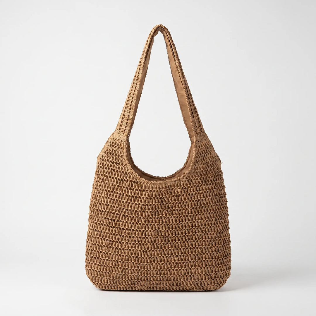 Roomy women's summer beach bag, a woven shoulder tote perfect for carrying essentials to the shore.