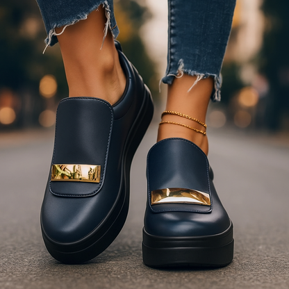 Stylish Celina Rise platform sneakers for women with elegant gold accents & comfort sole.