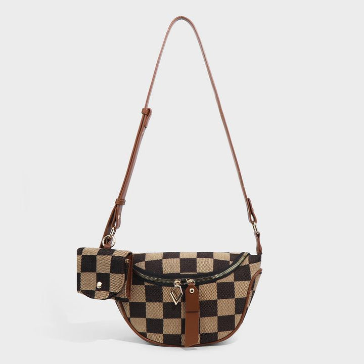 Women's checkered canvas belt bag with leather trim, perfect for everyday style & versatile wear.